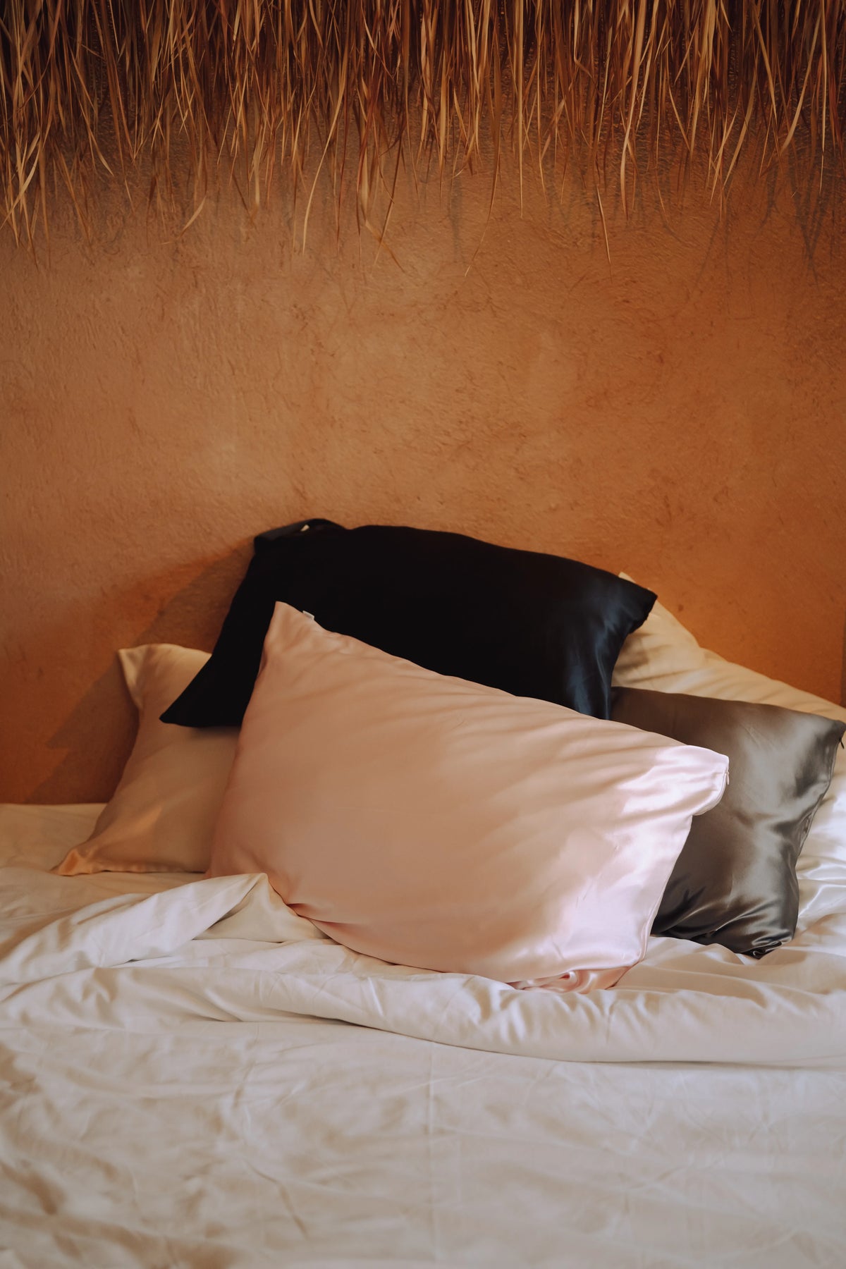 mixed pillowcases piled on top of each other